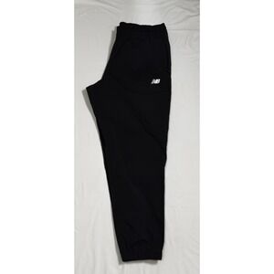 Size XL - New Balance Tapered Windbreaker Joggers Black